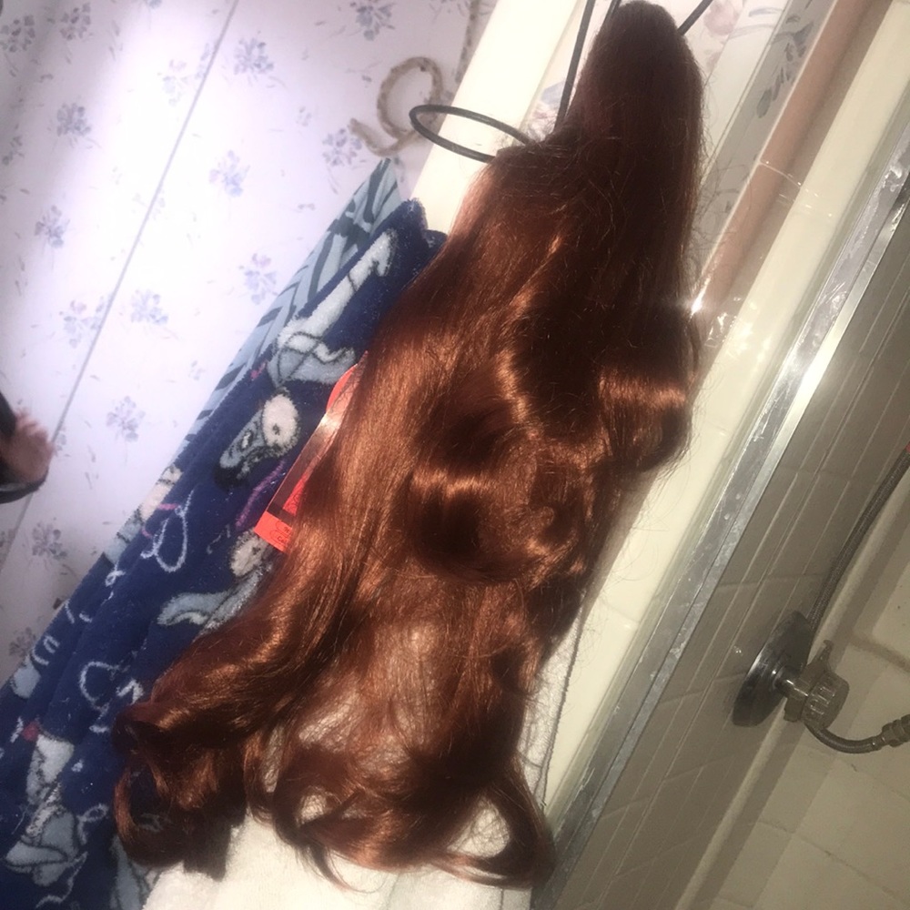 24 inch long reddish brown banana clip hairpiece